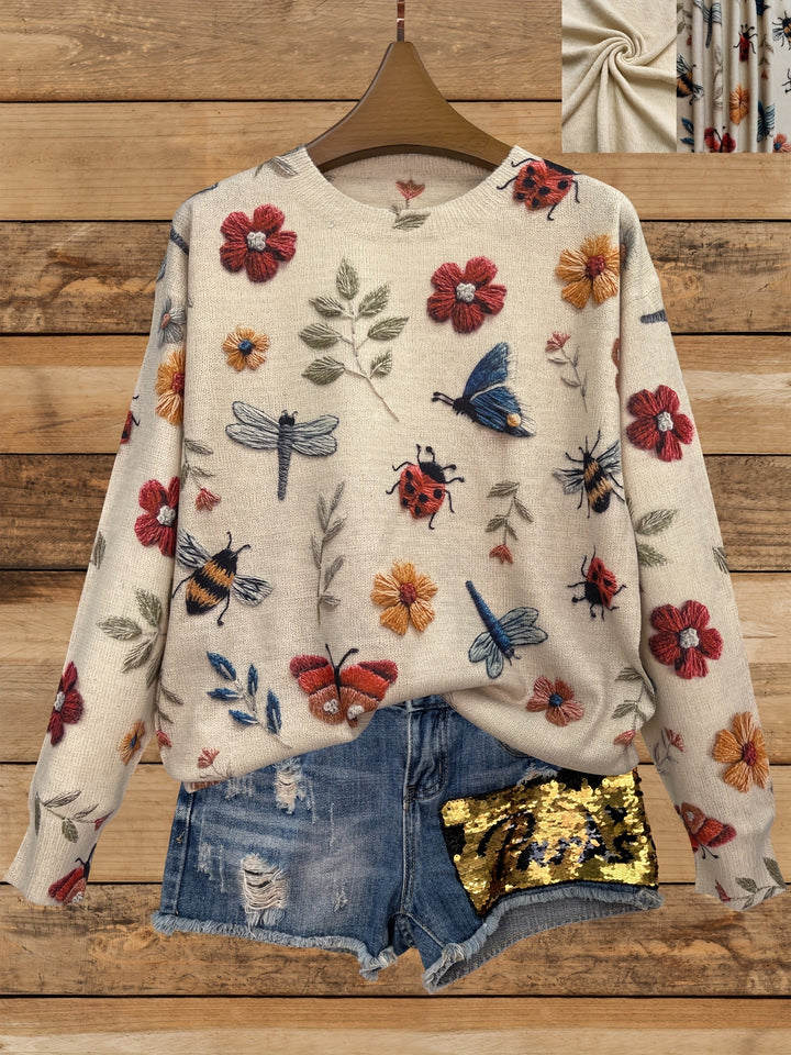 Etta – Lässiger Pullover mit floraler Insektenoptik