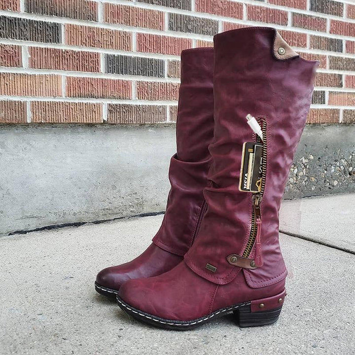 Kirsten – Kniehohe Vintage-Stiefel mit Reissverschlusstasche und klobigem Nietenabsatz (Ausverkauf 2024)