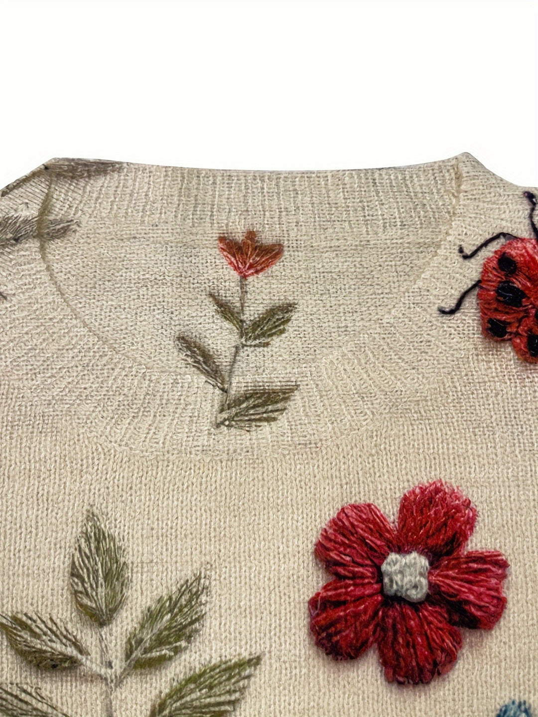 Etta – Lässiger Pullover mit floraler Insektenoptik