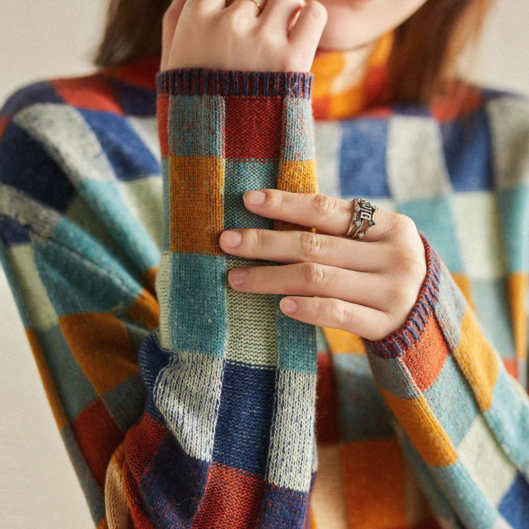 Adalynn | Bunter Rollkragenpullover mit Patchwork-Strickmuster